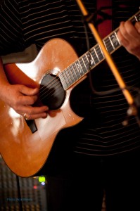 This old guitar has seen lots of smiles and miles